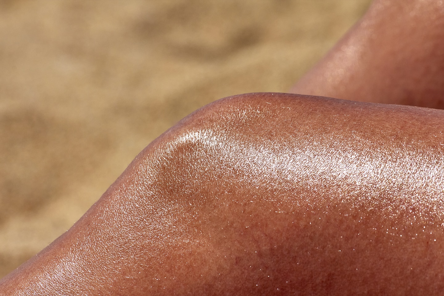 a close up of a person's tanning legs